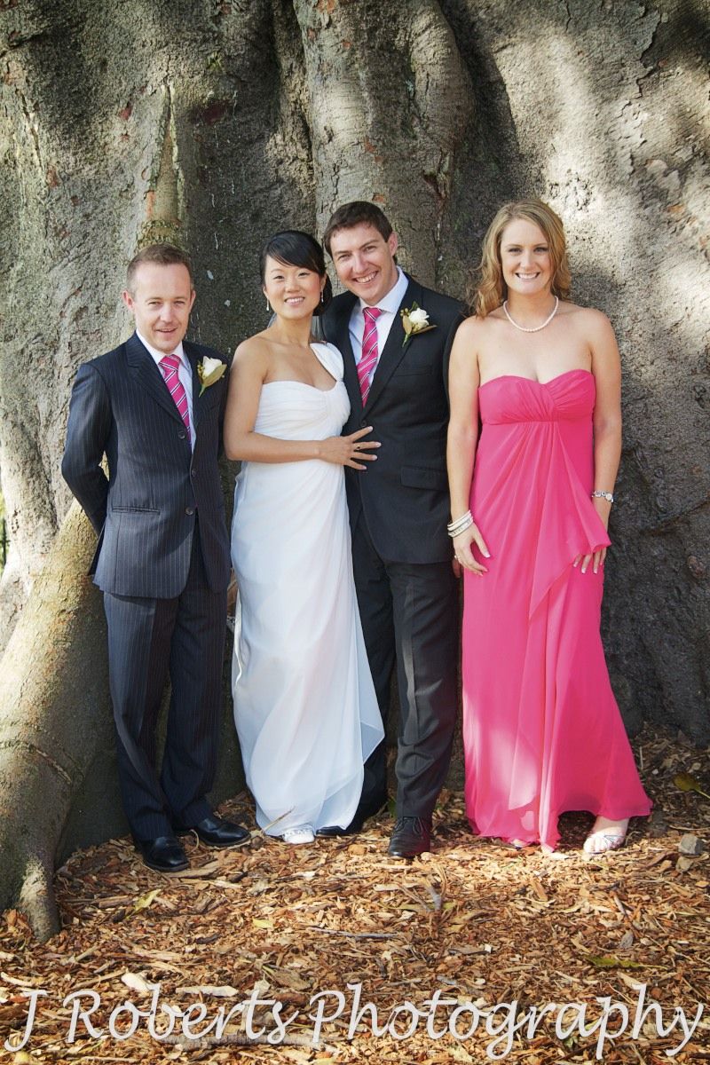 Bridal party under fig tree at Observatory Hill - wedding photography sydney